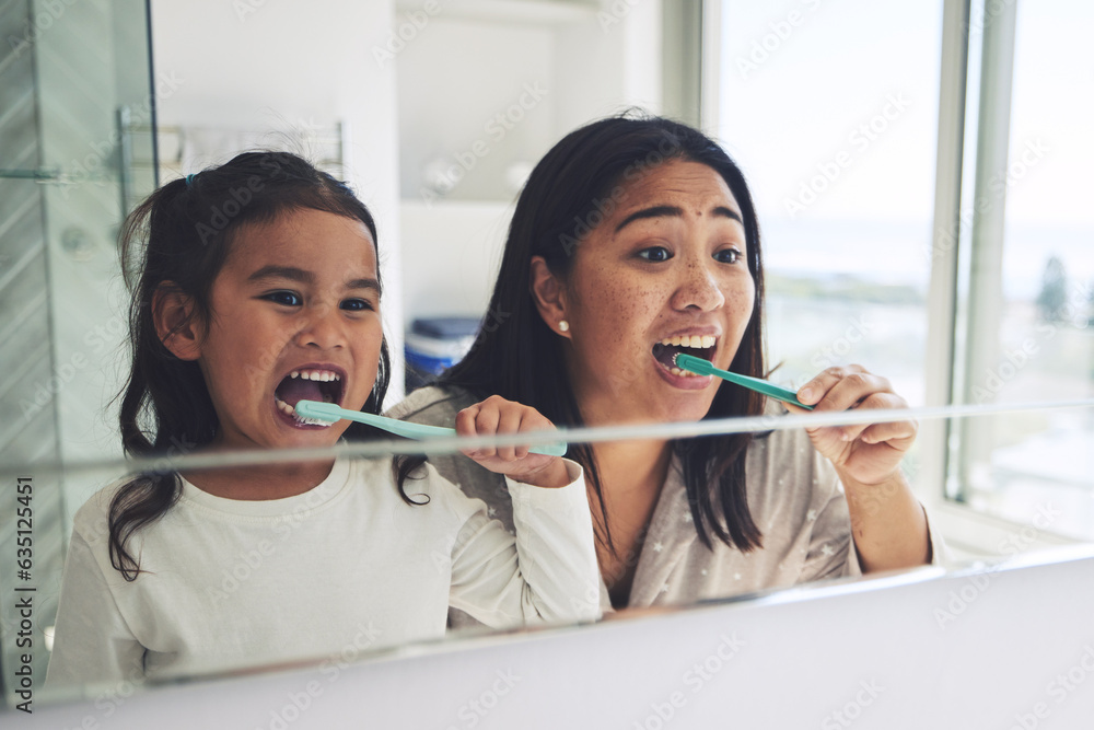 Mother, child and brushing teeth in dental hygiene, morning routine or healthcare together by mirror