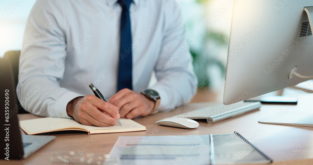 Lawyer and attorney working on corporate plans and compiling legal reports for a case at his desk. B