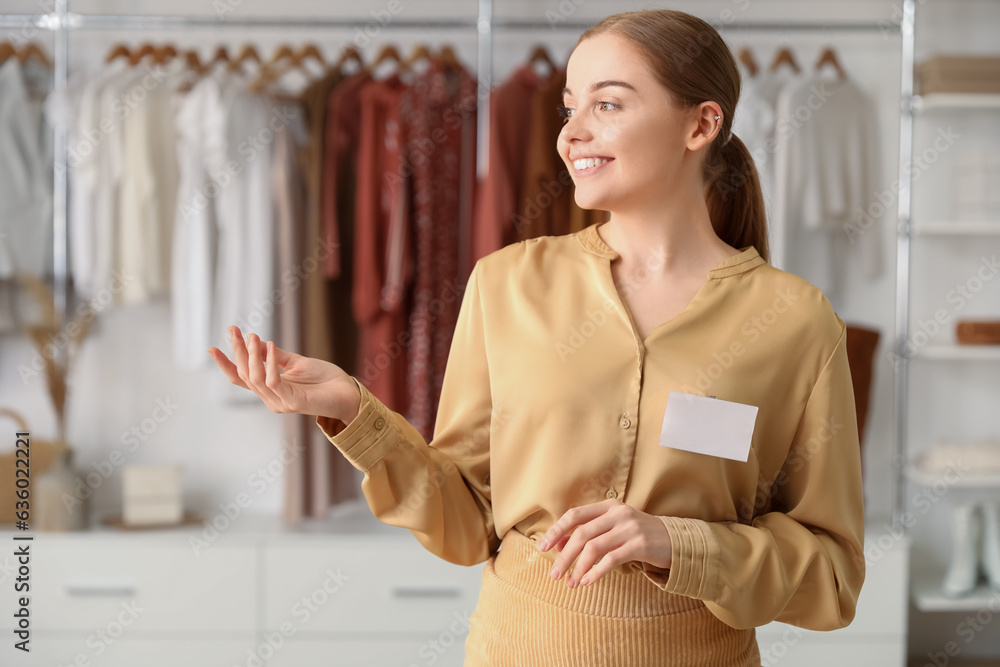 Female seller in stylish boutique