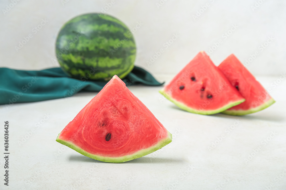 Piece of fresh ripe watermelon on light background, closeup