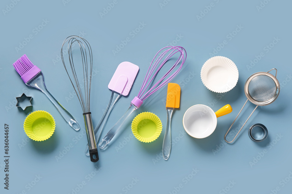 Baking utensils on blue background