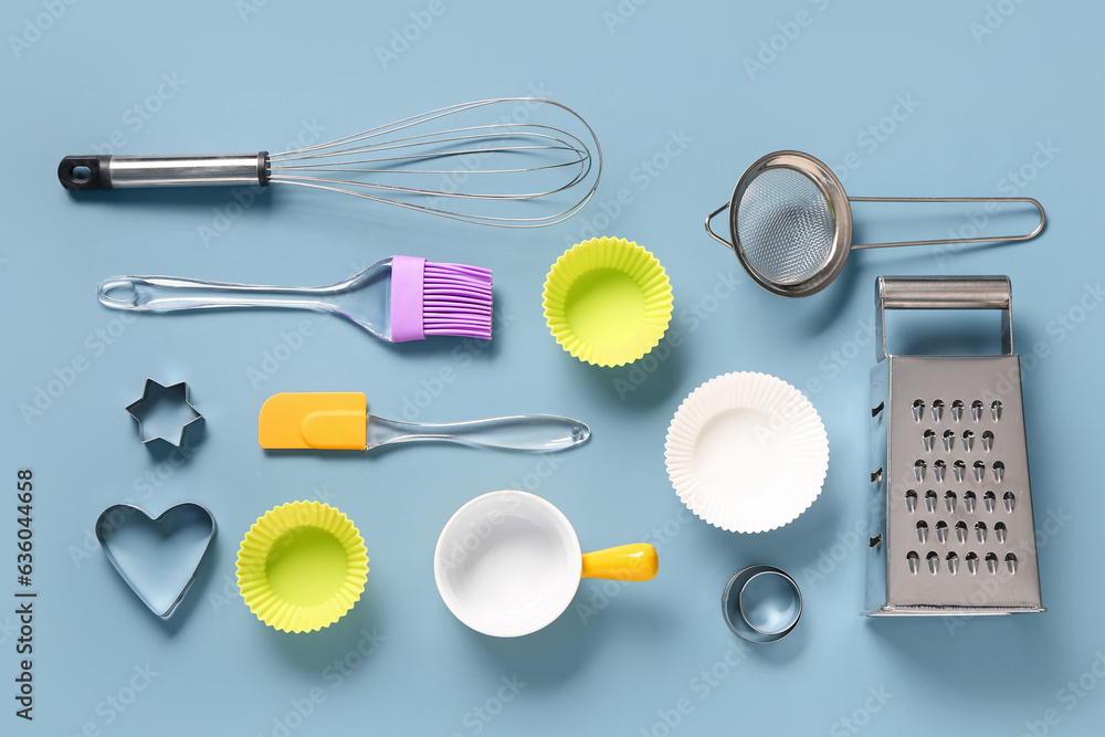 Baking utensils on blue background