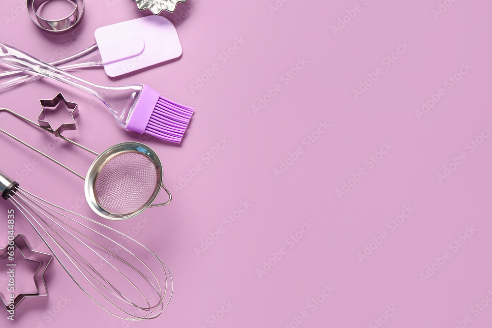 Baking utensils on pink background