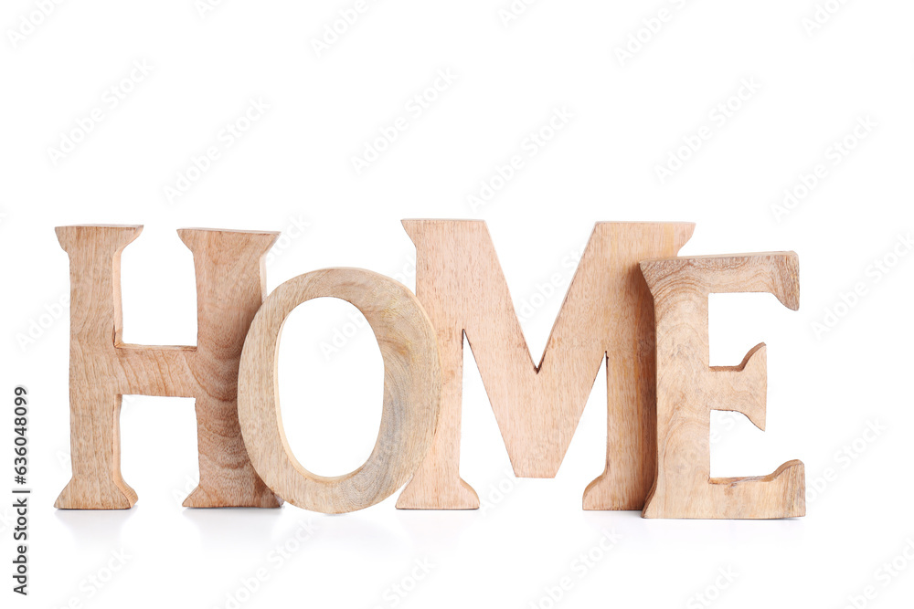 Decorative wooden letters forming word HOME isolated on white background