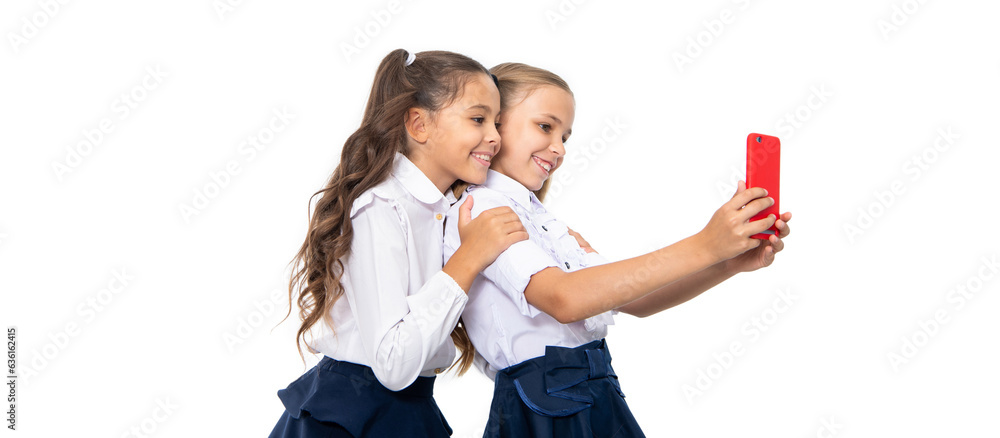 back to school. girls children having selfie time. school friends blogging and taking selfie with ph