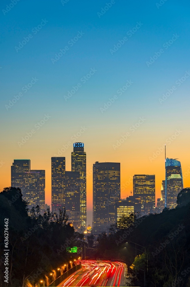 Dawning Urban Energy: 4K Image of Los Angeles Downtown and Morning Traffic at Sunrise