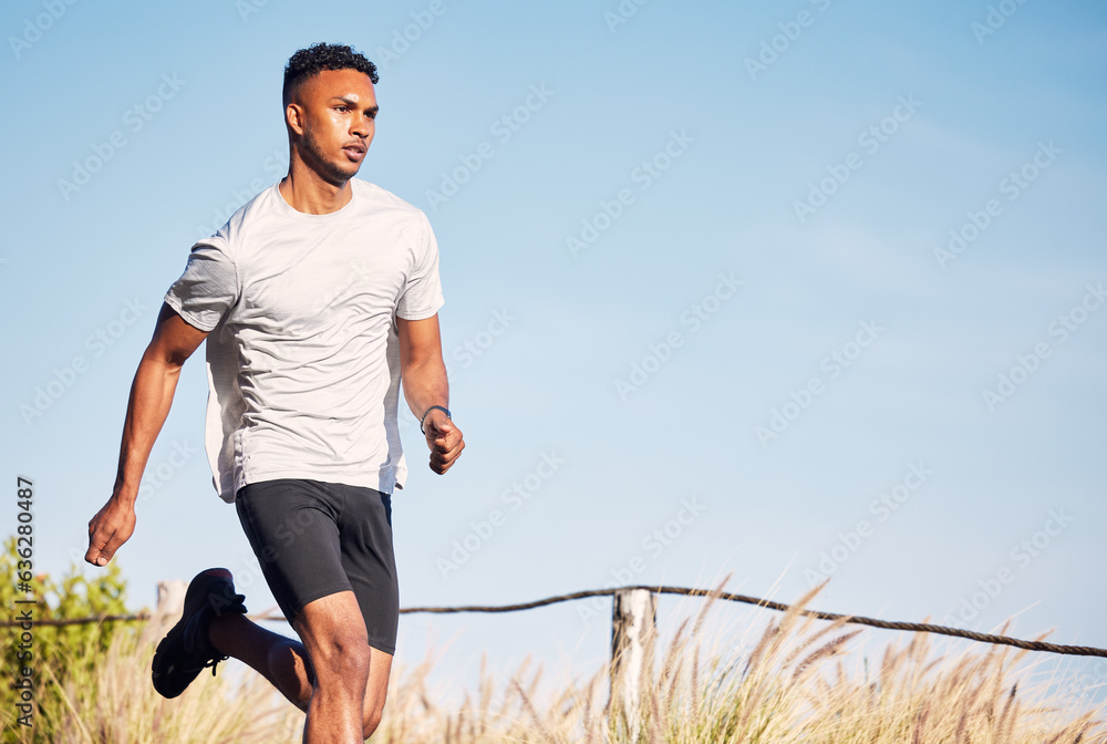 Man, running and training on road in mountain, nature or outdoor exercise and athlete in healthy wor