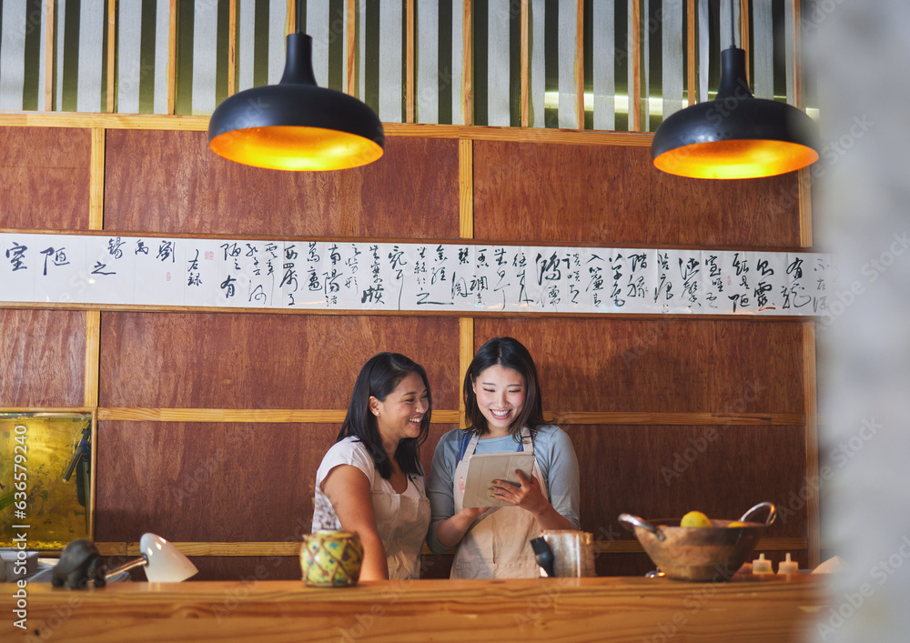 Restaurant, tablet and asian women at counter together checking sales, booking or menu for small bus