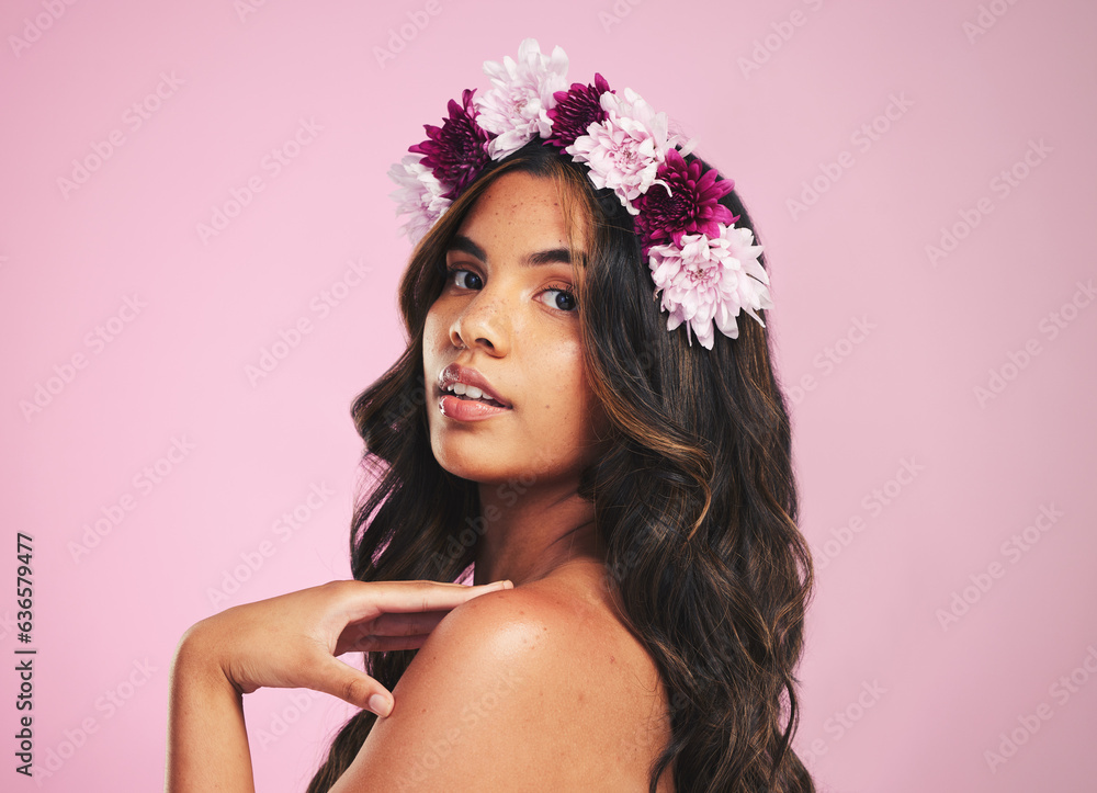 Woman, flowers and portrait of crown in studio for beauty, natural skincare and spring plants on pin