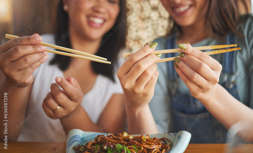 Chopsticks, restaurant and friends hands with noodles and Asian cuisine at a cafe. Happy, hungry wom