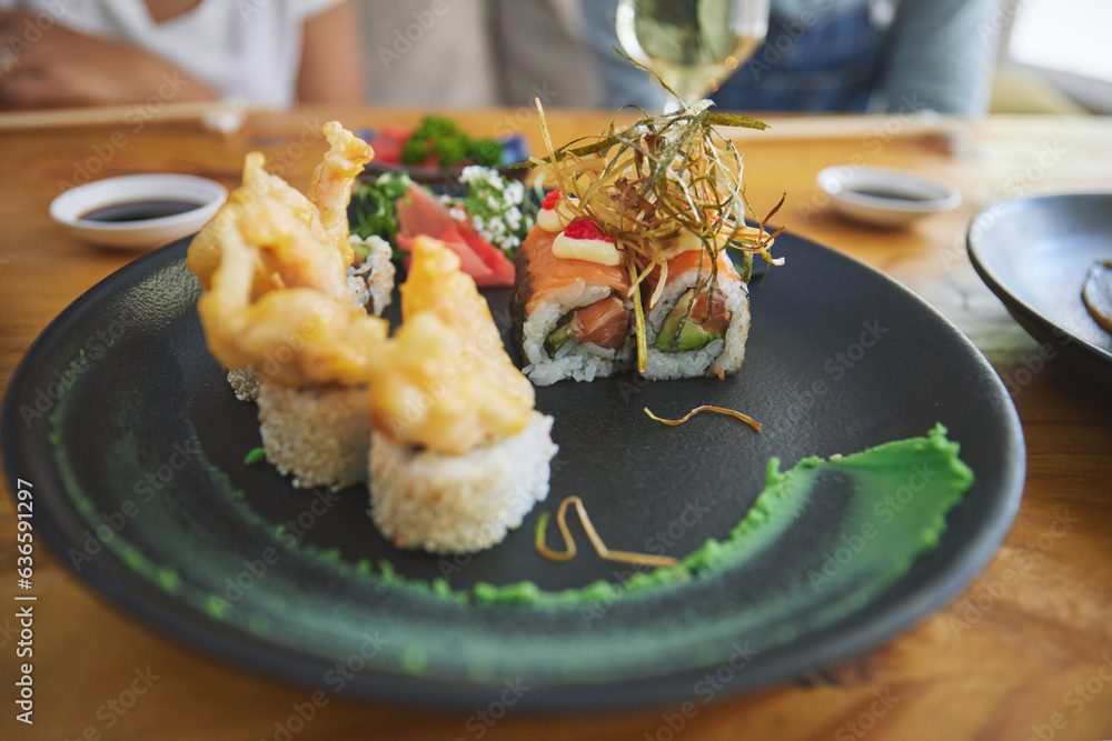 Japanese, sushi and food at a restaurant for dinner or lunch meal at a healthy Asian cafe on table. 