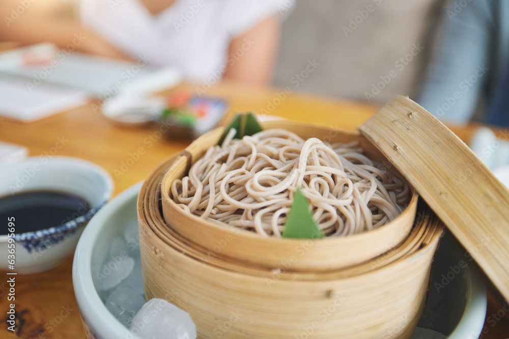 Restaurant, bamboo and closeup of a bowl of noodles for authentic Asian cuisine for diet. Food, stea