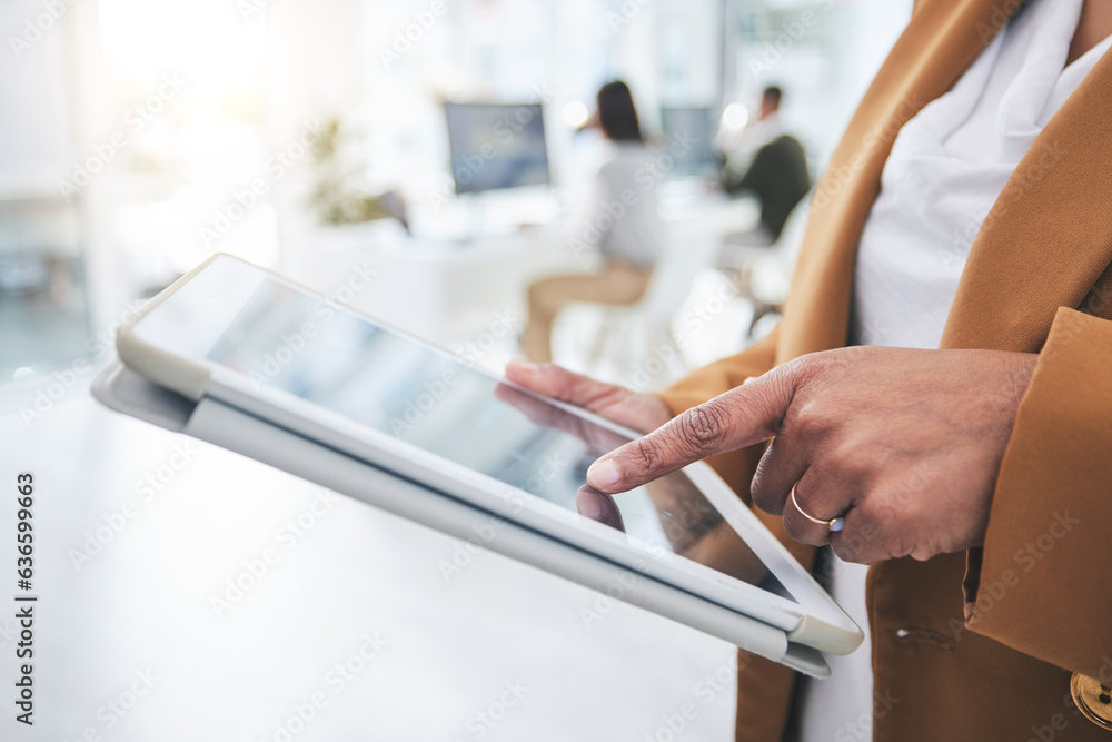 Hands, web design or businesswoman typing on tablet in office, working on email or research project 