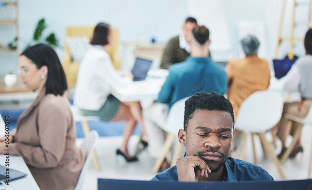 Man, reading and thinking on computer in office with employees, staff and workplace with business pe