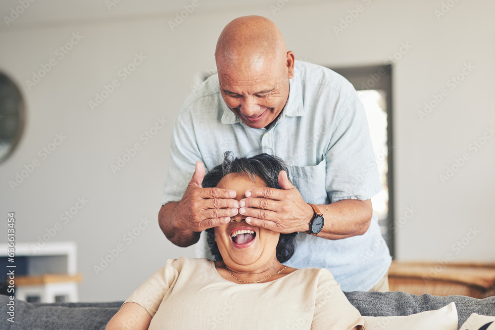 Surprise, eyes closed and senior couple on sofa for happiness, relaxing and bonding in home. Marriag