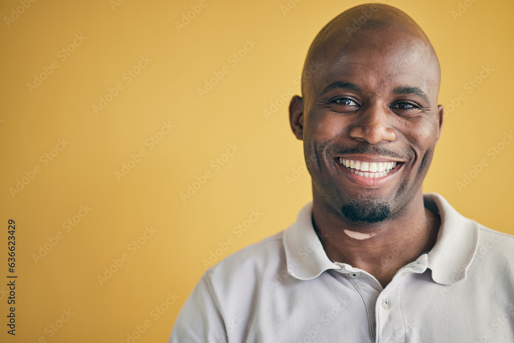 Face, smile and black man, designer and entrepreneur in studio isolated on a yellow background mocku