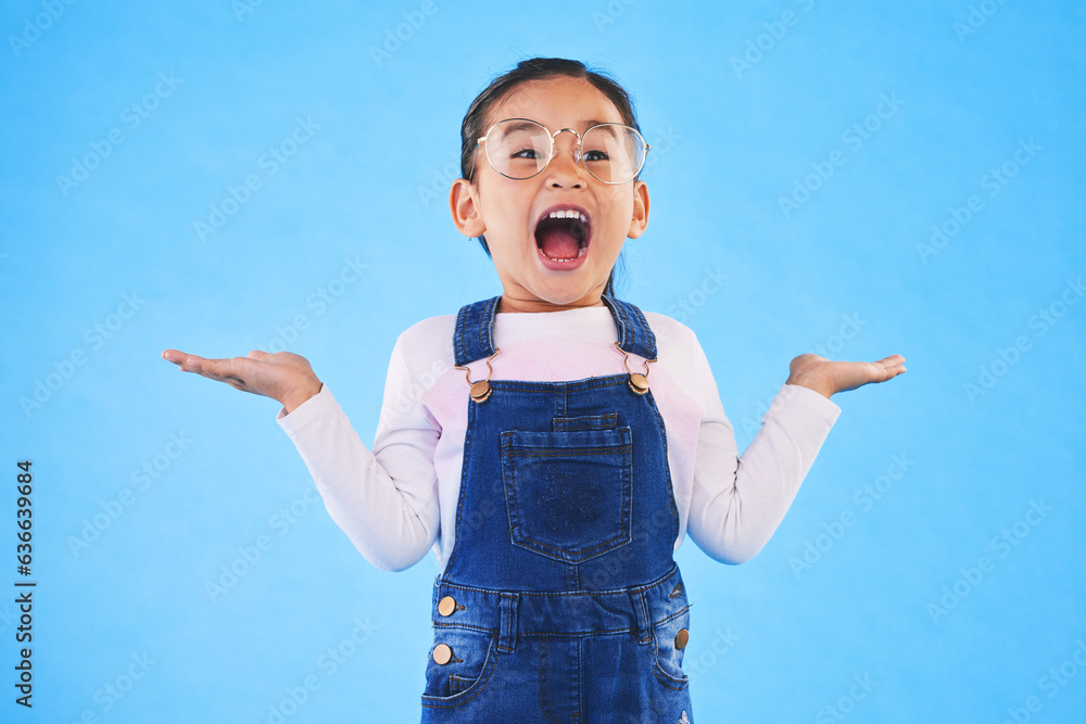 Excited, happy surprise and girl kid with hand gesture, expression and announcement isolated on blue