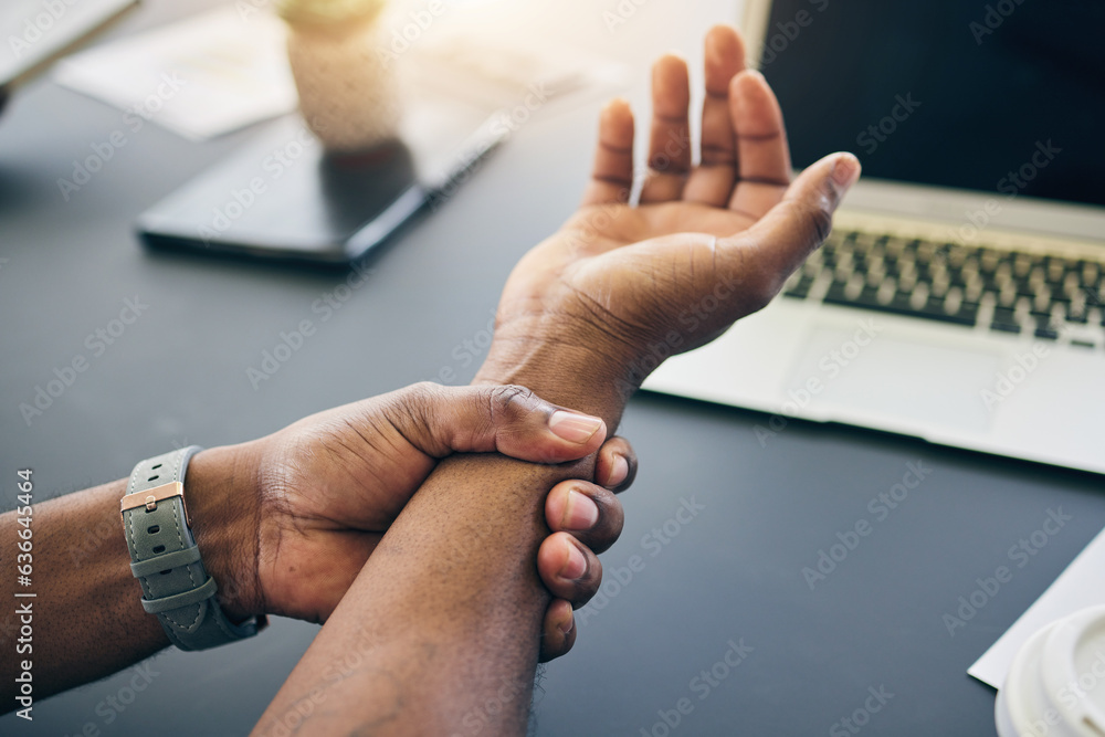 Closeup of a businessman with wrist injury, pain or accident in the office with carpal tunnel. Medic