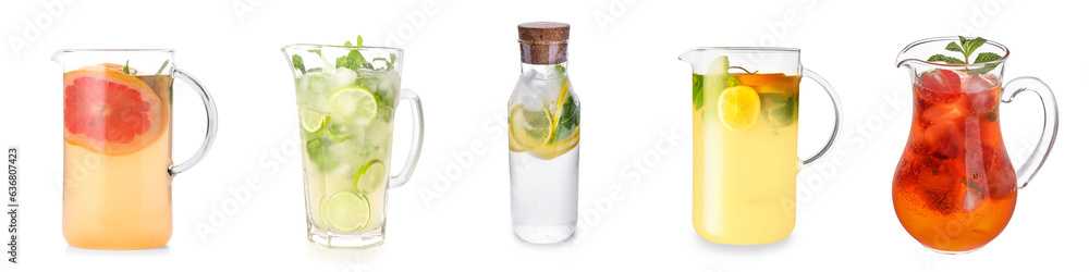 Set of glass jars with tasty cold lemonades on white background