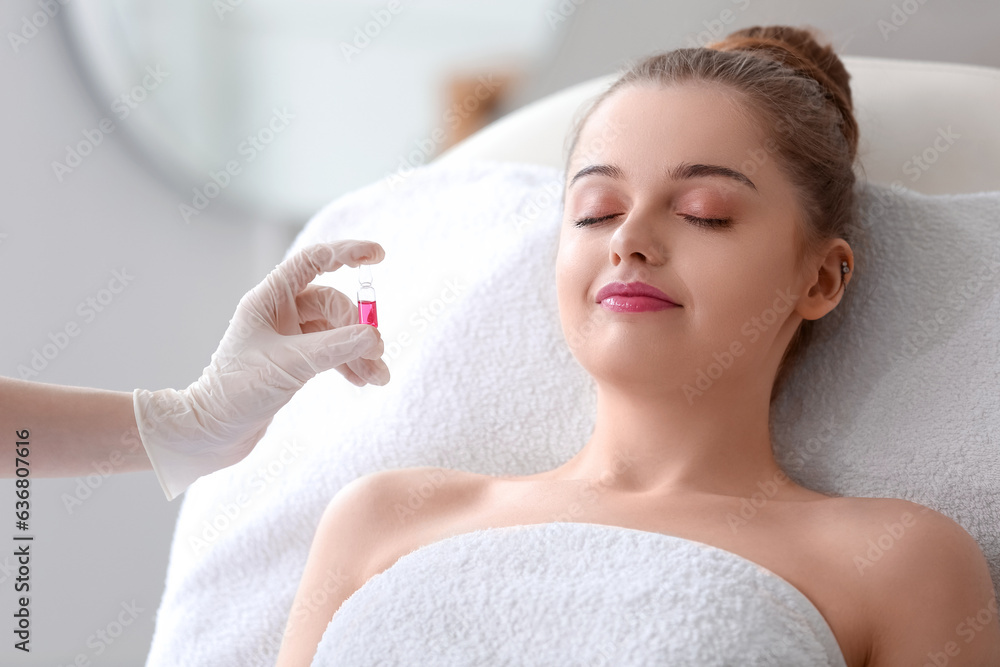 Young woman undergoing treatment in beauty salon. Skin care concept