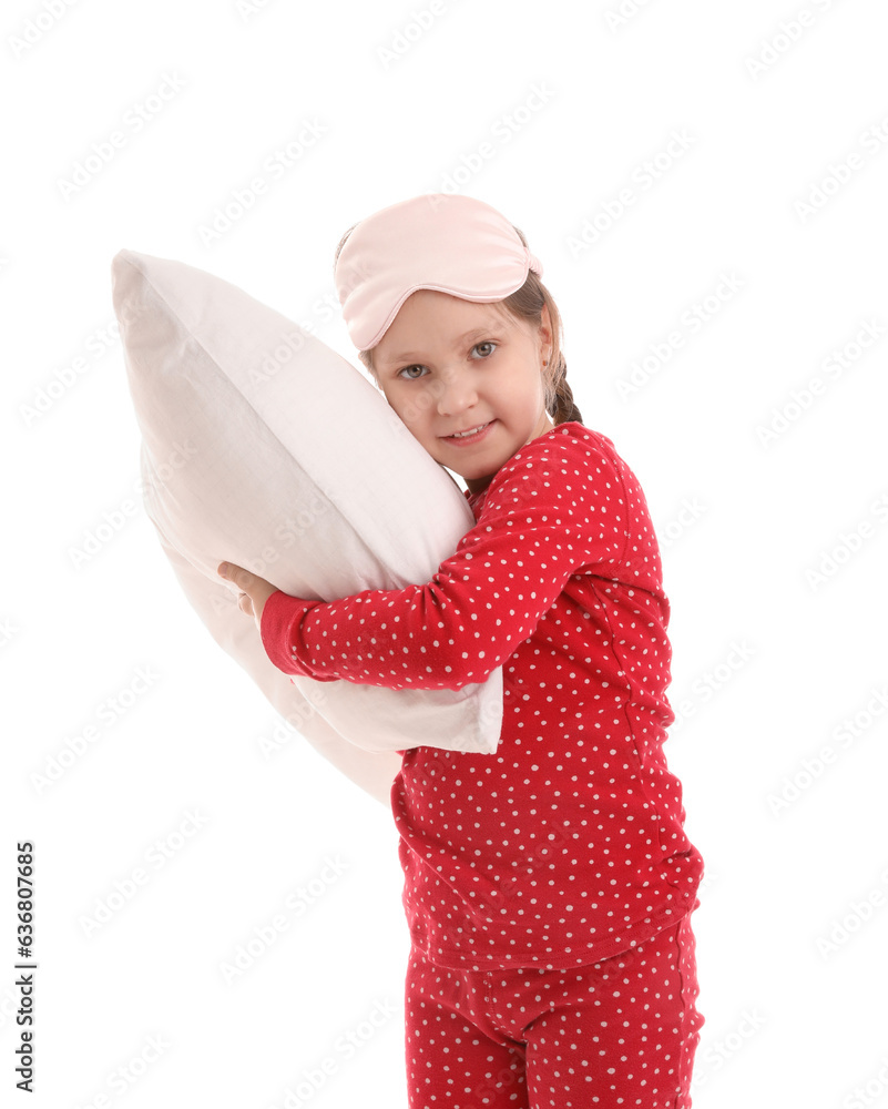 Little girl with sleeping mask and soft pillow on white background