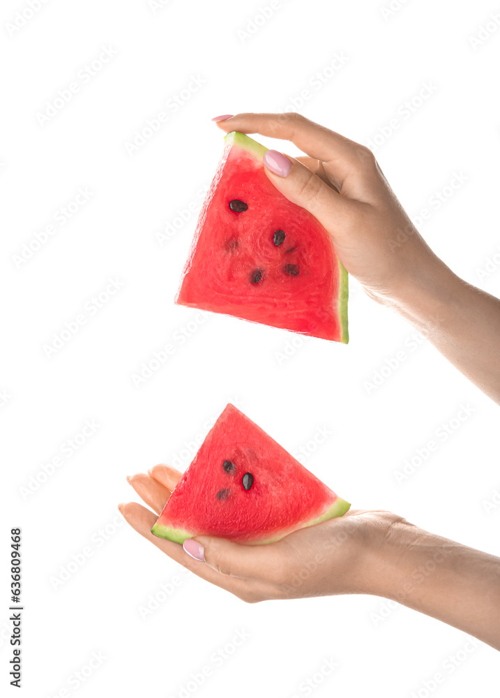 Female hands with pieces of ripe watermelon on white background