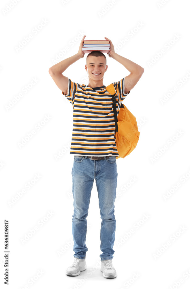 Happy male student with backpack and books isolated on white background