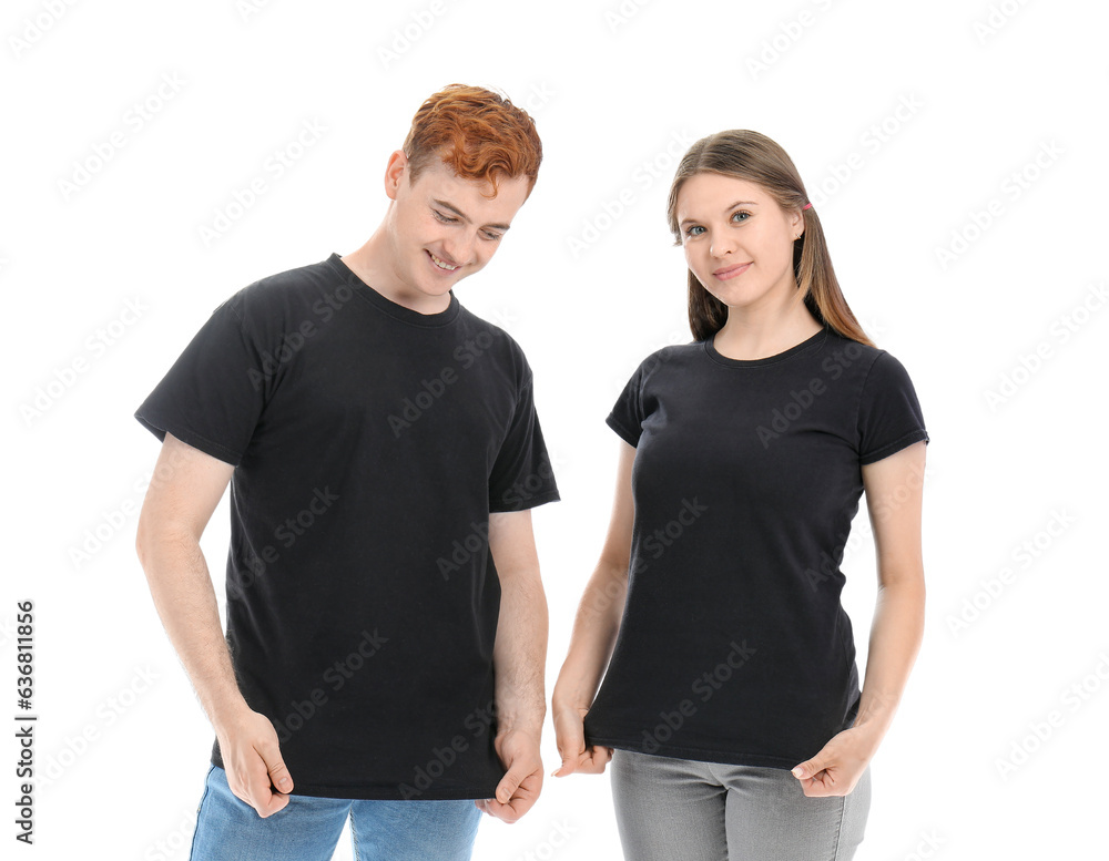 Young couple in black t-shirts on white background