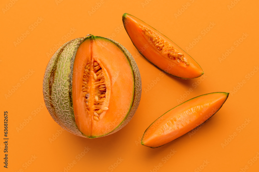 Tasty ripe melon on orange background