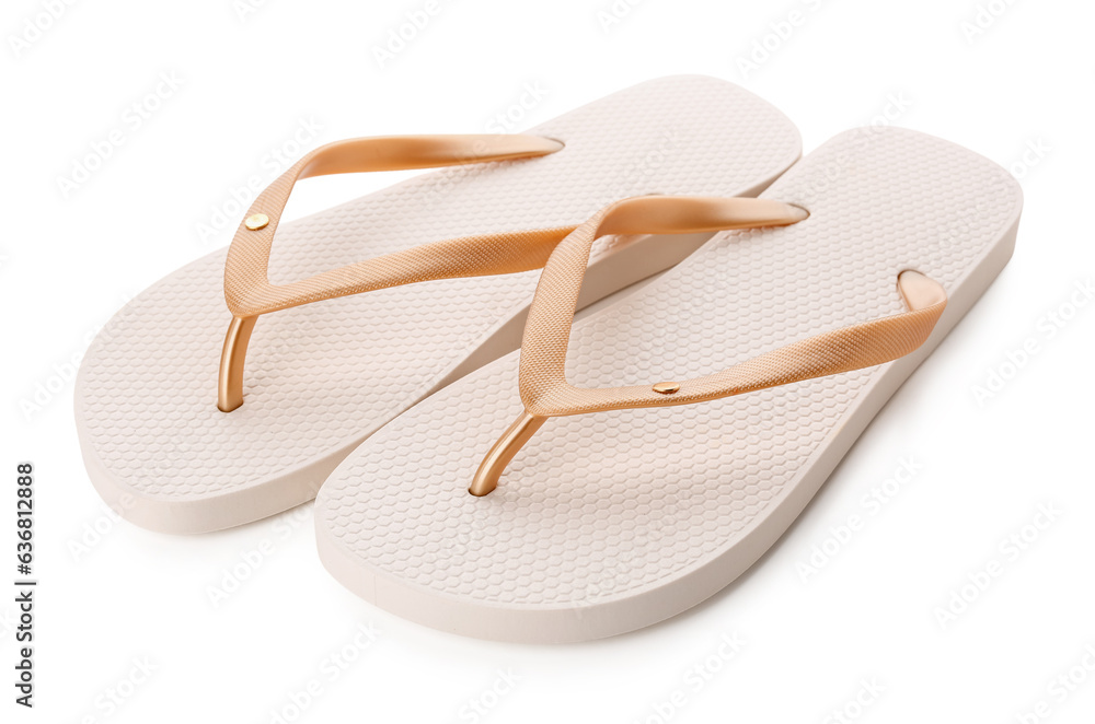 Beige female flip flops on white background