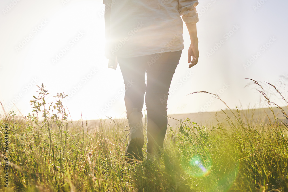 Back, sunrise and a woman walking on a farm for sustainability or growth in the morning with flare. 