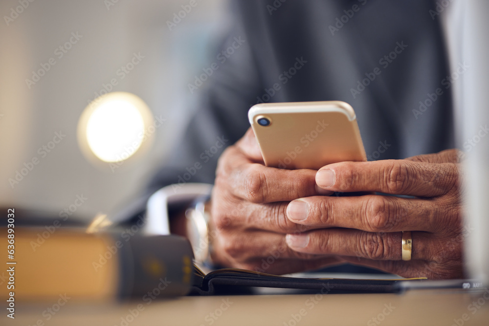 Closeup hand, typing and a person with a phone for communication, email check or contact. Desk, work