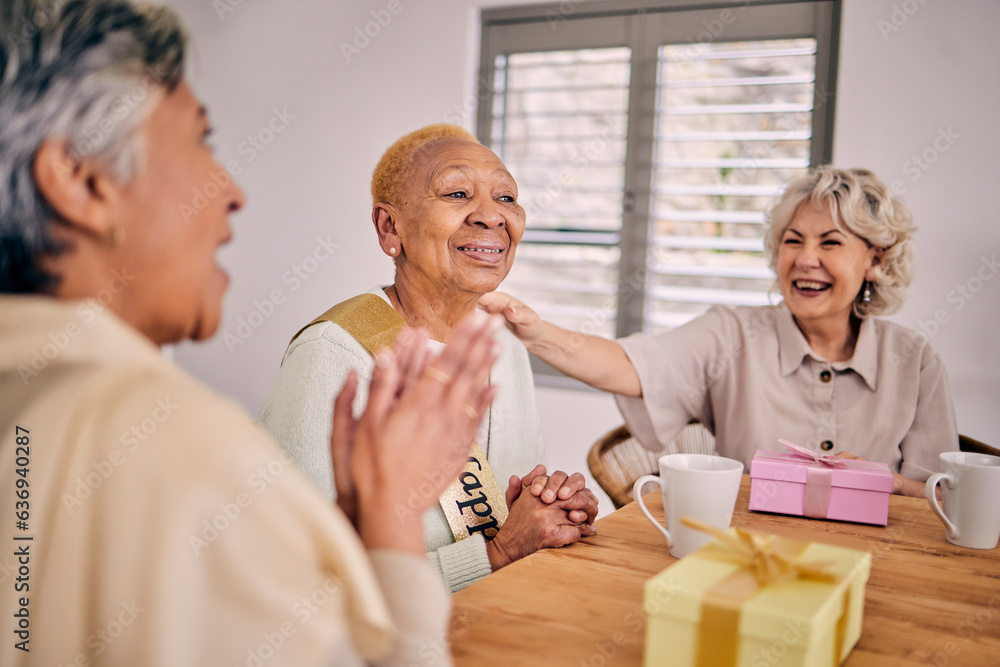 Senior friends, birthday singing and party at a home with a present and gift with excited people. Su