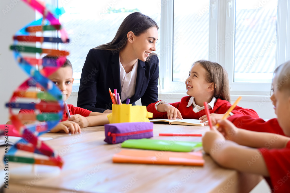 Female teacher conducting lesson in classroom