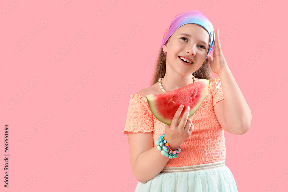 Happy little girl with slice of fresh watermelon on pink background