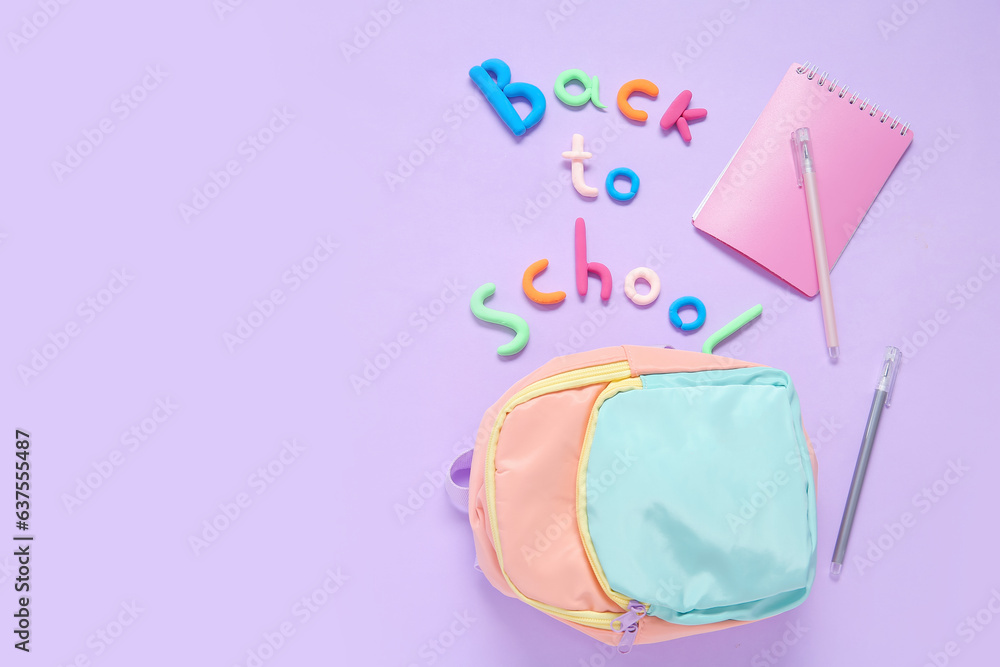 Text BACK TO SCHOOL, backpack and stationery on lilac background