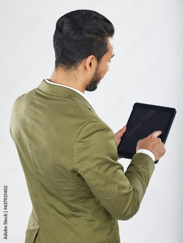 Back, business and man with a tablet, career and professional on a white studio background. Japanese