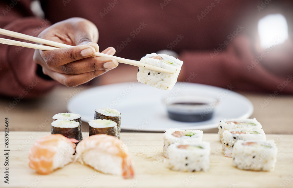 Sushi, seafood and restaurant with hands of person in store for brunch, Japanese cuisine and menu. F