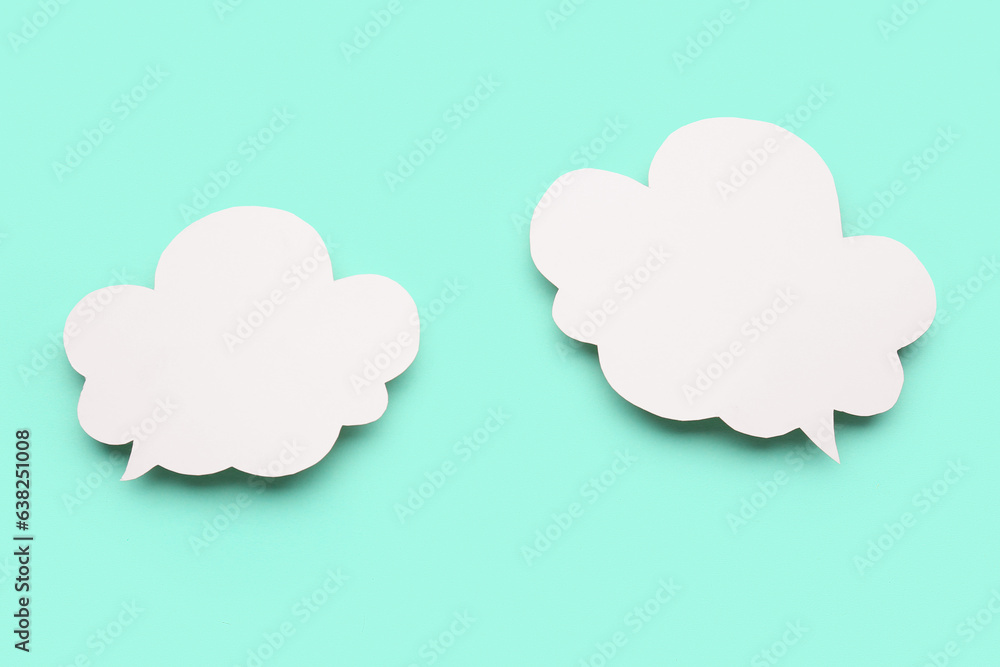 Blank speech bubbles on turquoise background