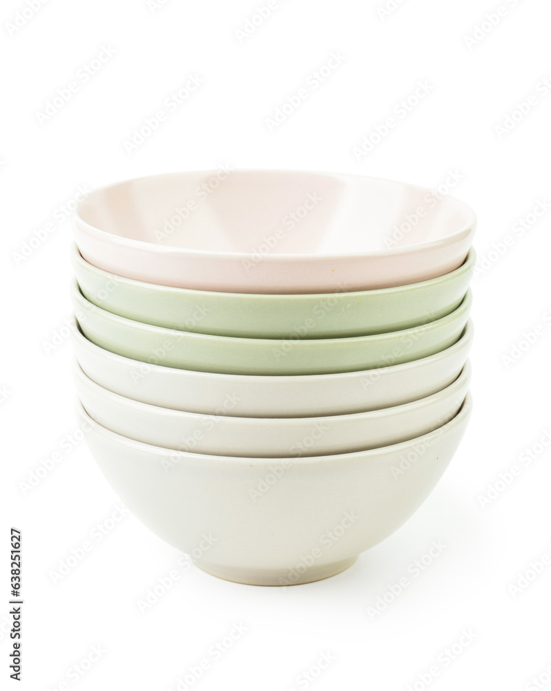 Set of color bowls on white background