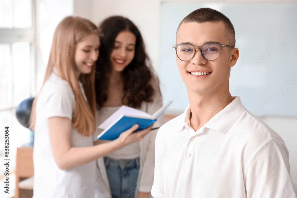 Male student in classroom, closeup