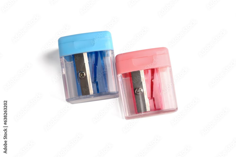 Colorful pencil sharpeners on white background