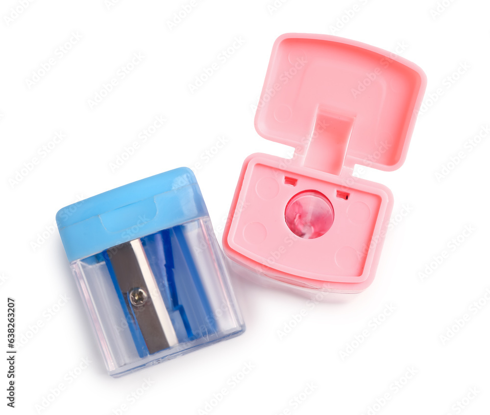 Colorful pencil sharpeners on white background