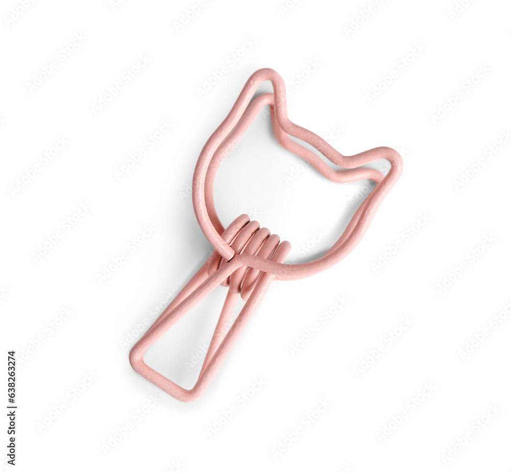 Pink binder clip in shape of cat on white background