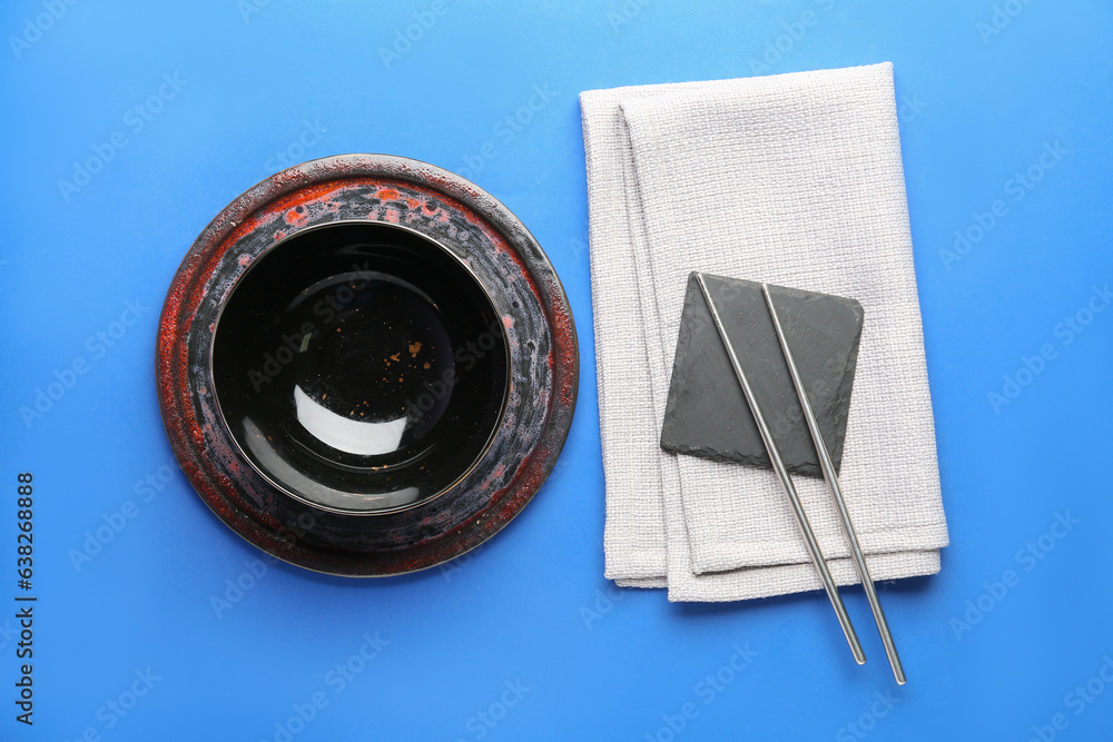 Chinese table setting on blue background