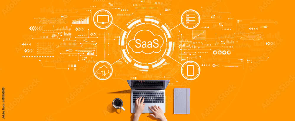 SaaS - software as a service concept with person working with a laptop