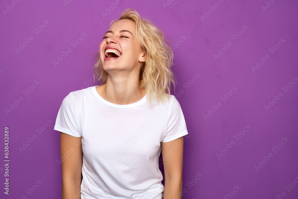 happy and smiling female wearing white tshirt for mock up on purple background