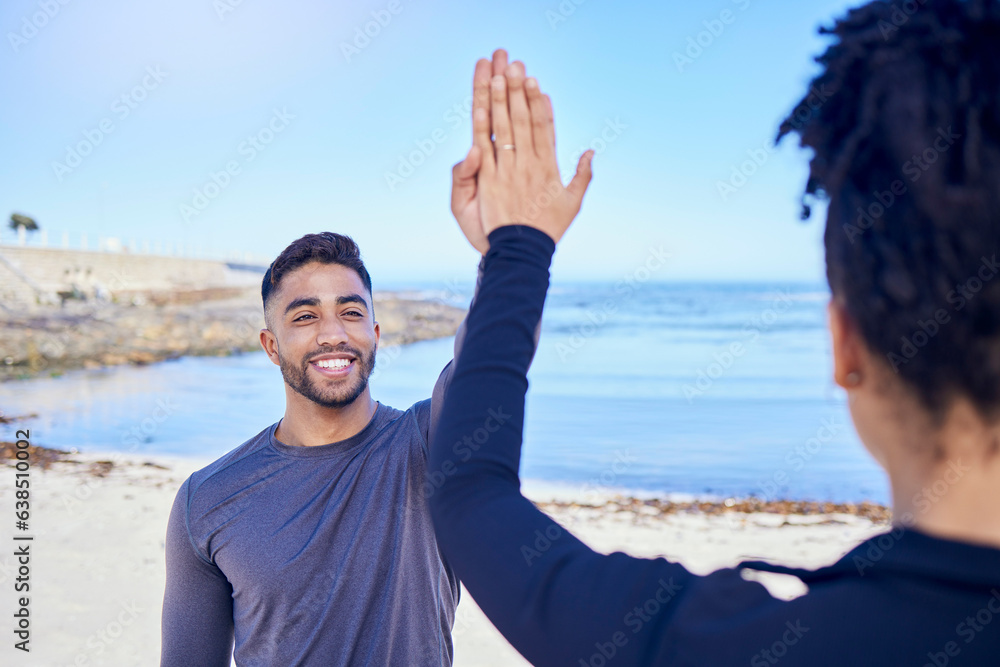 Fitness, couple and high five on the beach for exercise, outdoor workout or training for water sport