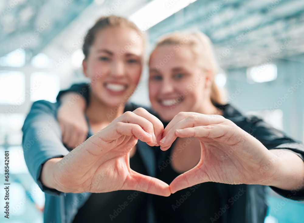 Happy woman, swimming and heart hands in care, support or teamwork in sport fitness together at pool