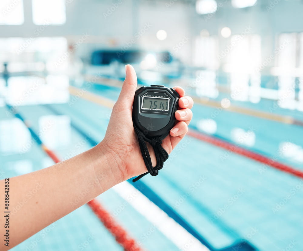 Person, hand and stopwatch by pool in swimming, race or sports training in fitness, exercise or work